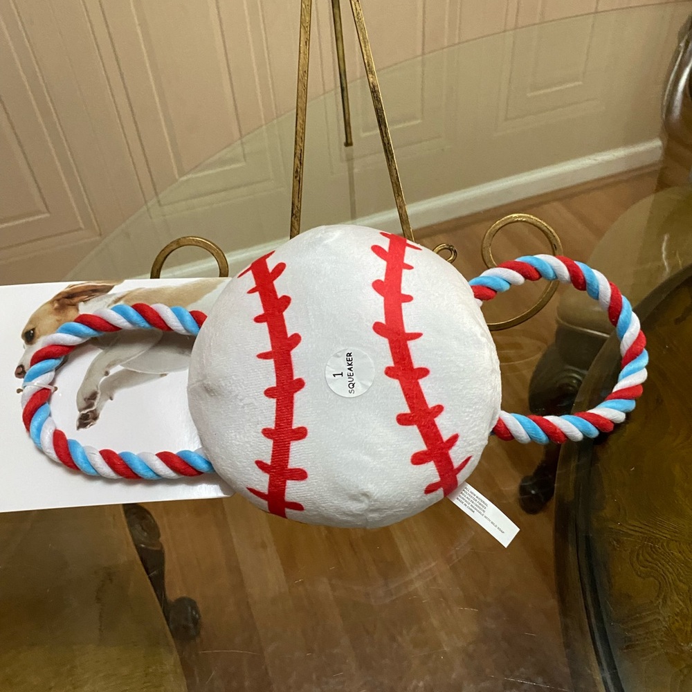 Brand New  Tug Toss & Fetch Dog Toy With Squeaker .